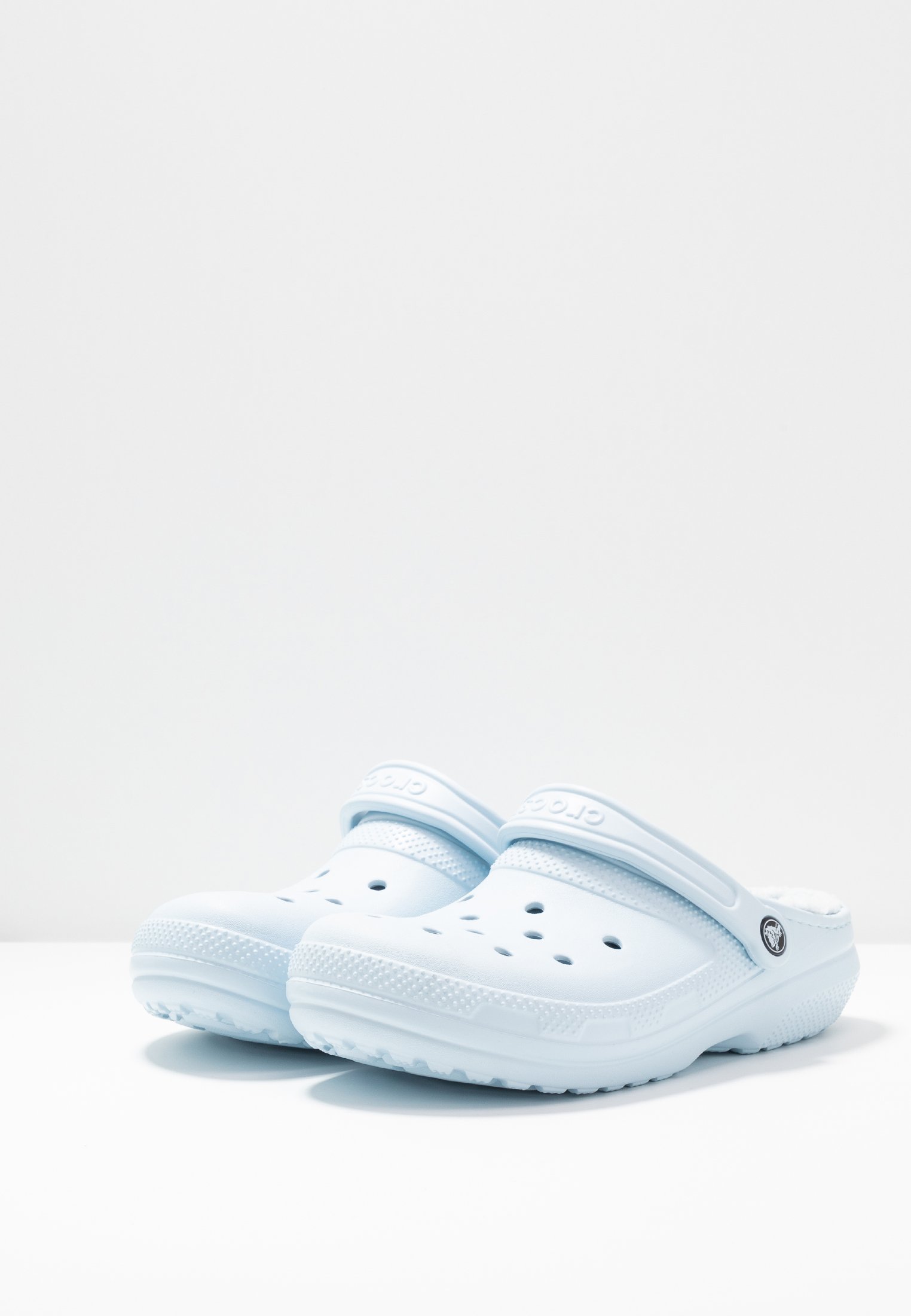 lined light blue crocs