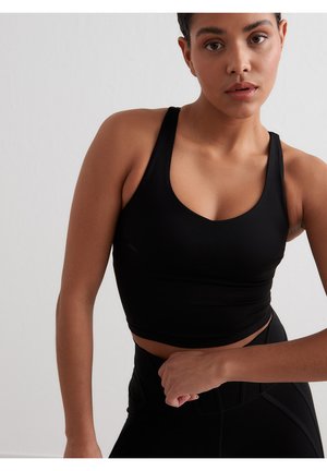 SCULPTING STRAPPY BRALETTE - Light support sports bra - black