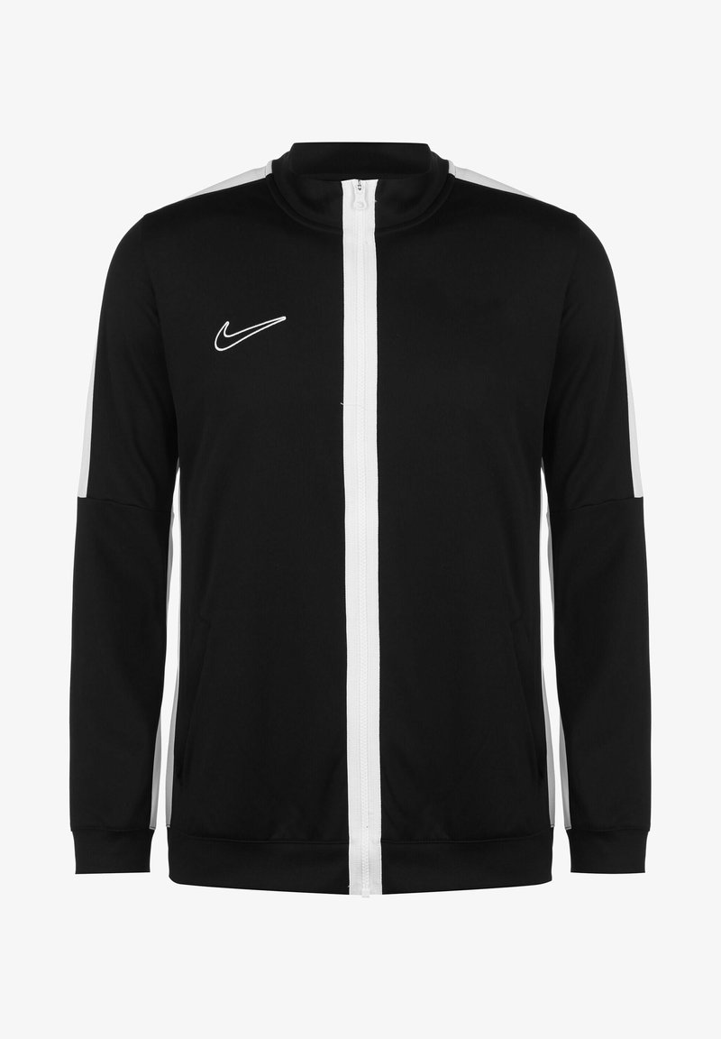Veste noire Nike zippée avec des rayures blanches verticales sur les manches et la fermeture éclair frontale, avec un logo Nike blanc sur la poitrine gauche.
