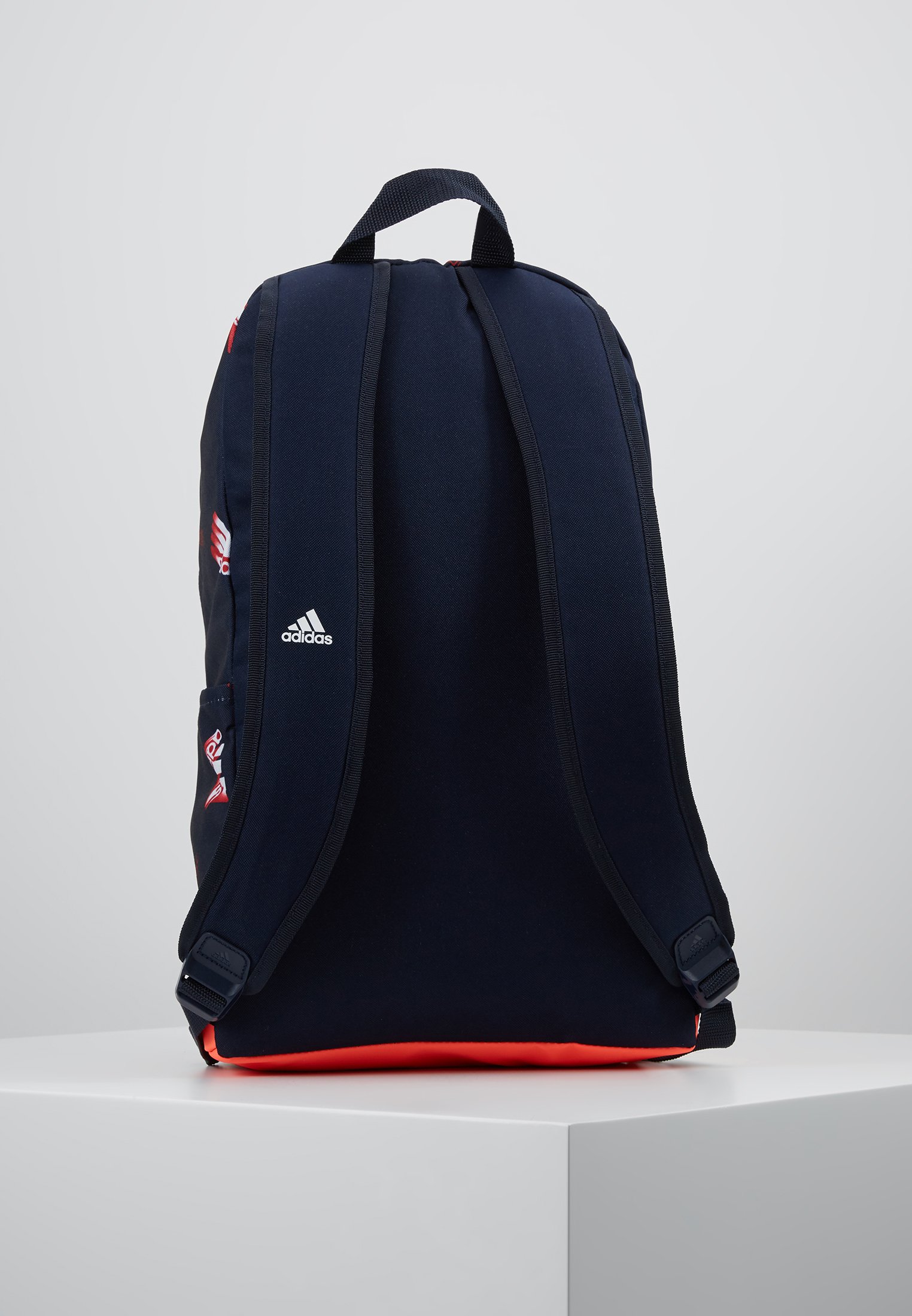 red and white adidas backpack