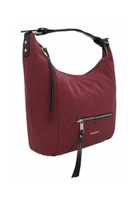 Burgundy axelväska med slät yta, svarta detaljer, ett handtag ovanpå och en frontfick med dragkedja som har en dekorativ frans.