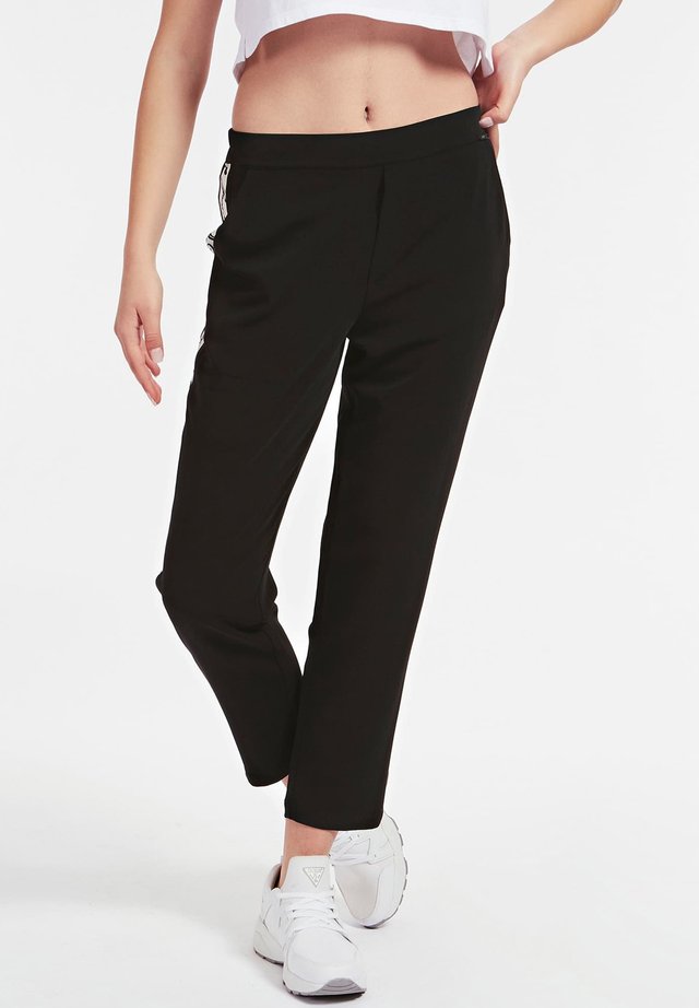 Schwarze Guess Jogginghosen für Damen online kaufen | Zalando