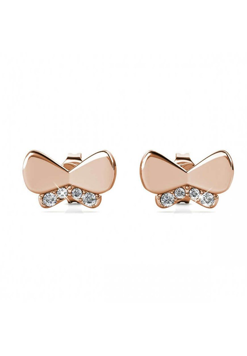 Orecchini in oro rosa a forma di fiocco, decorati con tre cristalli trasparenti al centro di ciascun fiocco. Superficie liscia con finitura lucida.