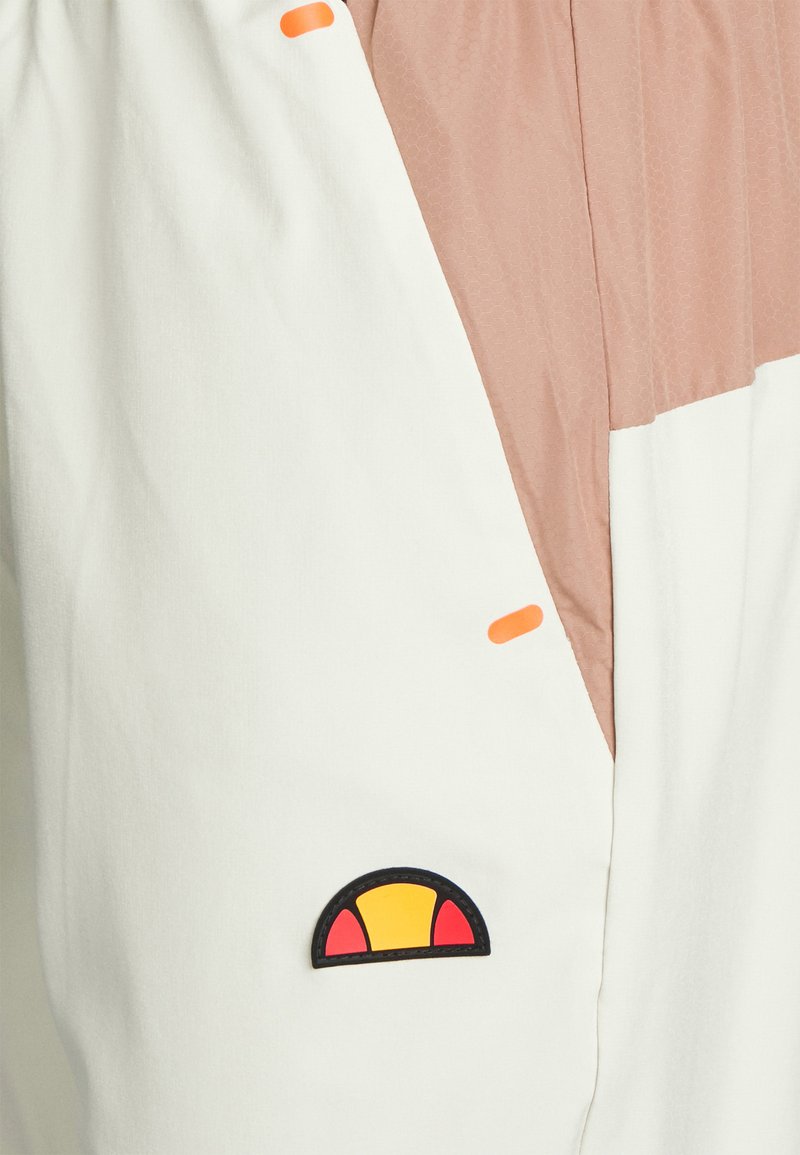 Herren Trainingsanzüge | Ellesse HAESTEN TRACK PANT Jogginghose beige - KQ10486 Herren Trainingsanzüge | Ellesse HAESTEN TRACK PANT Jogginghose beige - KQ10486