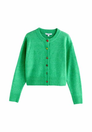 Cardigan verde lavorato a maglia con maniche lunghe e polsini a coste, dotato di bottoni a forma di frutta tra cui fragola, limone, ciliegia, mela, ananas e pomodoro.