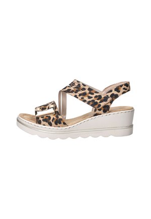 Wedge sandal with leopard print straps, adjustable buckle, cushioned footbed, and white scalloped sole.