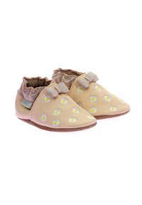 Chaussures en cuir tan avec broderie de marguerites, tissu doré froncé autour de la cheville et petits nœuds sur les côtés. Design à semelle souple.