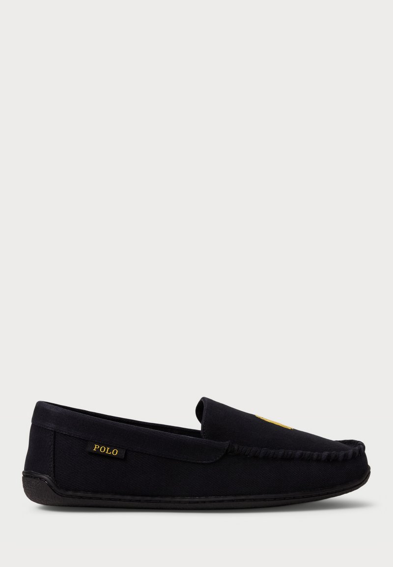 Black fabric loafer with a rounded toe, decorative stitching, and a gold "Polo" logo on the side. Textured rubber sole for grip.