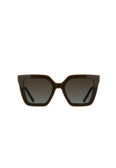 Lunettes de soleil oversize marron avec une monture géométrique et des verres dégradés, dotées de branches épaisses marron et d'une finition lisse.