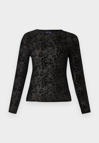 Camiseta negra de manga larga hecha de tela suave, con un patrón floral texturizado con rosas. Cuello redondo clásico, forma ajustada.