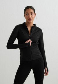 aim’n® - SCULPTING ZIP - Trainingsjacke - black Thumbnail-Bild 1