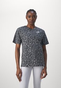Puma ANIMAL RELAXED TEE - Triko s potiskem - black