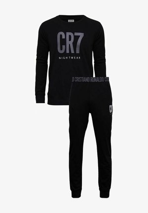 Zwarte langekleding top met "CR7 NIGHTWEAR" opdruk, gecombineerd met zwarte joggingsbroek met een logo-elastische tailleband en zijzak.