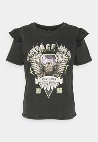Camiseta negra de manga corta con mangas con volantes, que presenta un gráfico de un águila, "BICIS Vintage" y texto debajo, en blanco y verde.