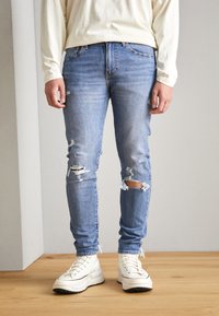 Levi's® - 512™ SLIM TAPER - Kavbojke na korenček - blue denim Miniaturna slika 1