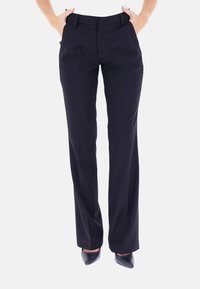 Pantaloni eleganti blu navy realizzati in tessuto liscio, con taglio classico, gambe dritte e motivo a piccoli puntini, dotati di tasche laterali e passanti per cintura.