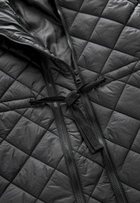 Next MATERNITY LONGLINE QUILTED BOMBER JACKET WITH HOOD - Wintermantel - black