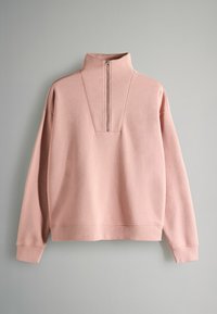 Rosa Quarter-Zip-Pullover aus weichem Stoff. Verfügt über einen hohen Kragen, lange Ärmel und gerippte Bündchen. Glatte Textur mit minimalen Nähten.