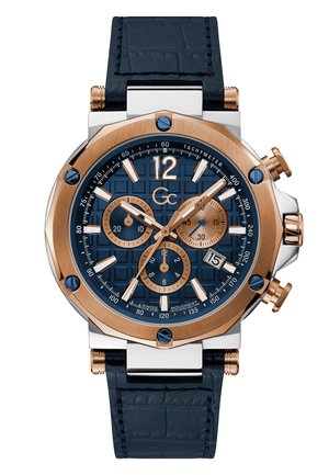 Chronograaf horloge met een blauw gestructureerd wijzerplaat, roségouden accenten en een marineblauwe lederen krokodillenband. Bevat drie sub-dials en een datumaanduiding.