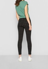 Urban Classics Leggings - Byxor - black