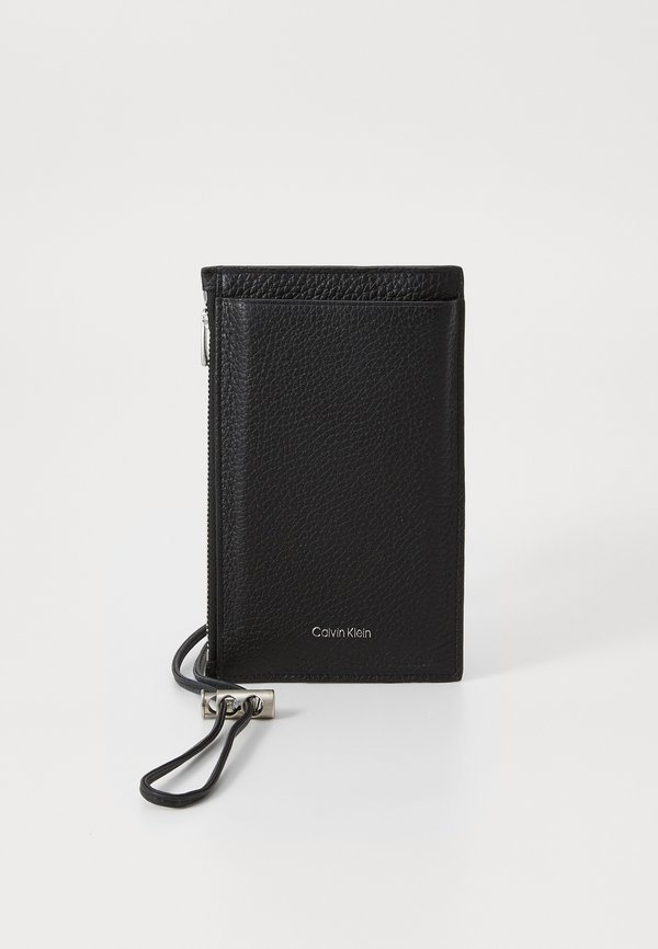 EMBOSS PHONE CROSSBODY - Phone pouch