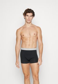 Calvin Klein Underwear TRUNK 3 PACK COTTON STRETCH - Boxer alsónadrág - black/wild aster/grey heather/arctic green