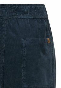 Marineblaue Cordshorts mit einem elastischen Bund, Seitentasche und einem kleinen Markenpatch auf der Gesäßtasche. Strukturiertes Stoffdesign.
