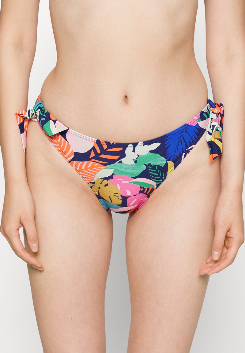 Parte de baixo de bikini multicolorida com padrão floral. Apresenta uma base azul-marinho, laços laterais e tons brilhantes contrastantes de rosa, verde e laranja.