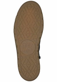 Suela de zapato de goma con un patrón de goma texturizado, que presenta un logo circular. El diseño incluye un agarre en zigzag para una mejor tracción.