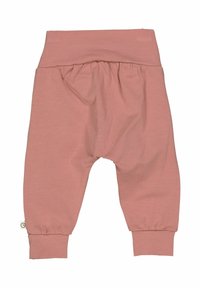 Pink cotton baby pants with a wide elastic waistband, gathered design, and fitted ankle cuffs, featuring a soft, smooth texture.