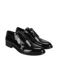 Chaussures de ville en cuir verni noir avec un bout rond, un système de laçage et une surface lisse et brillante. Semelle plate en caoutchouc et un minimum de détails.