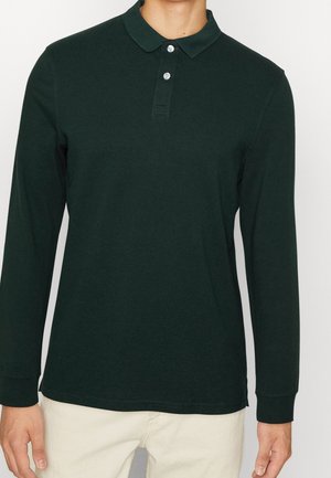Long-sleeve polo shirt in dark green cotton, featuring a classic collar, three-button placket, and stitched cuffs. Simple design, solid color.