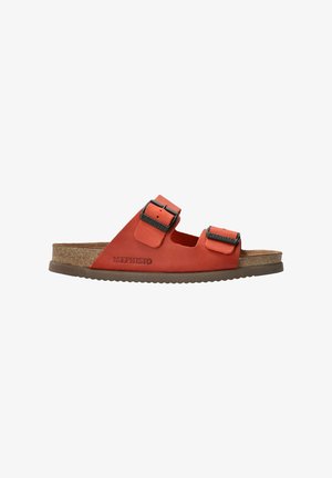 Sandale en cuir rouge à enfiler avec deux boucles réglables et une semelle intérieure en liège profilée, marquée "Mephisto" sur le côté et les boucles.