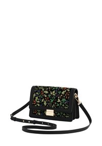 Black crossbody bag featuring colorful floral embroidery, gold hardware, and an adjustable strap. Smooth leather and textured fabric construction.