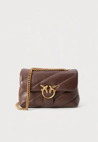 Brown quilted leather handbag with a gold-tone chain strap and a circular clasp featuring twin birds. Smooth texture with diagonal stitching.