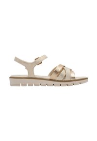 Metalliske guld sandaler med krydsede stropper, justerbar ankelspænde og en polstret sål. Letvægts og fleksibelt design.