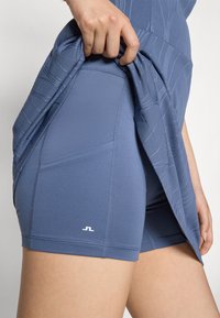 J.LINDEBERG Sports JILL DRESS 2-IN-1 - Tights - vintage indigo
