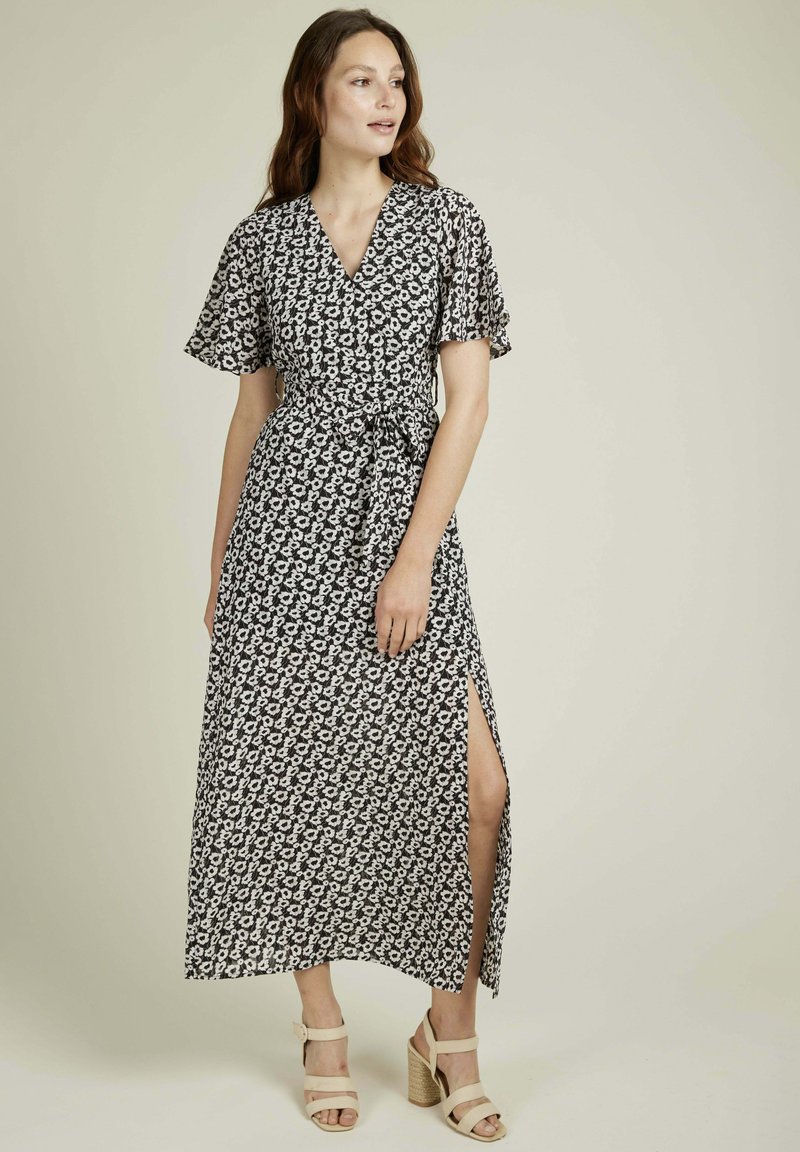 Robe Noire Lucy & Co – Taille M – Bustier Dos Nu – Mini Robe Asymétrique Fleurie