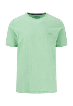 Mündroheline lühikeste varrukate ja puuvillane T-särk, millel on ümar kaelus ja väike trükitud logo vasakul rinnal. Sile tekstuur.