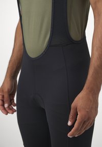 Sweet Protection CROSSFIRE CARGO SHORTS - Korte fietsbroek met bandjes - black