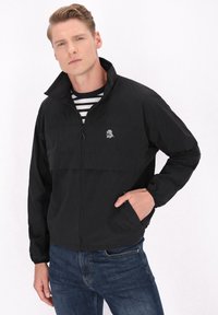 Schmuddelwedda Giacca da mezza stagione - black