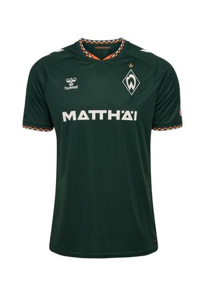 Dunkelgrünes Werder Bremen Fußballtrikot mit hummel-Logo, Matthäi-Sponsortext, diamantförmigem Mannschaftsabzeichen mit einem Stern und orange gemustertem Kragen und Bündchen.