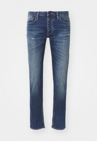 Mörkblå denimjeans med rak skärning, med subtila slitningar och en klassisk femfickedesign. Mjuk textur och robust sömnad.