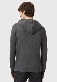 Sweat à capuche gris foncé en tissu texturé, manches longues, capuche avec cordon de serrage, ourlet droit et poignets côtelés.