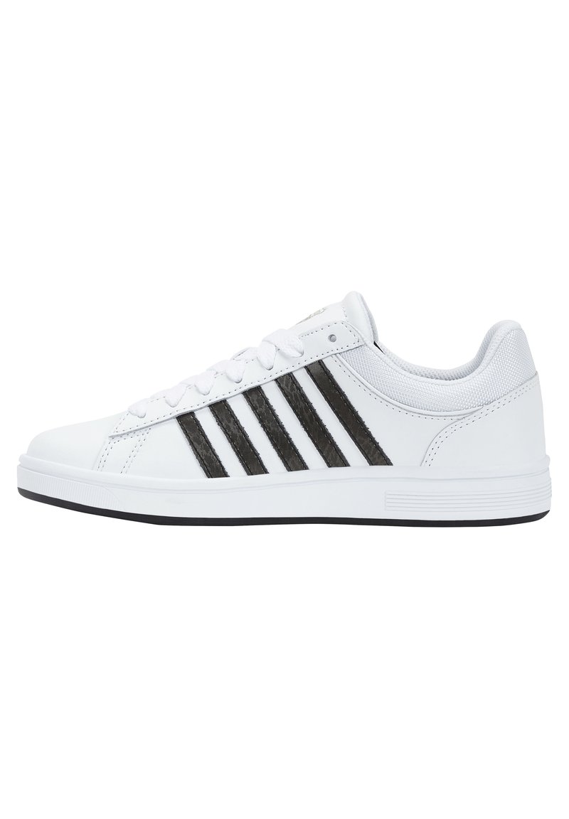 White sneaker with black stripes, smooth synthetic upper, lace-up design, and rubber sole, featuring a rounded toe and padded collar.