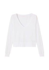 Hvid langærmet V-hals cropped sweater med ribstrikkede manchetter og kant, lagt fladt på en hvid baggrund.