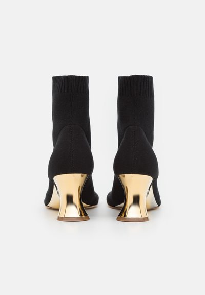 Wunderbar Stiefeletten Schwarz Mit Gold Bilder