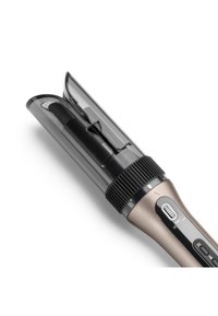 Appareil de coiffure avec un baril transparent, un corps doré métallique, une poignée noire texturée et des boutons de contrôle pour la température et les réglages.
