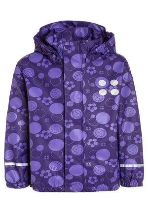 Lila Kinder-Regenjacke mit Kapuze, gemustert mit helllila Kreisen, Blumen, LEGO-Gesichtern und reflektierenden Streifen an Ärmeln und Brust.