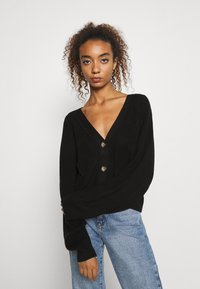 Monki Casaco de malha - black